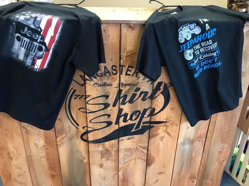 Black Label tees flat lay